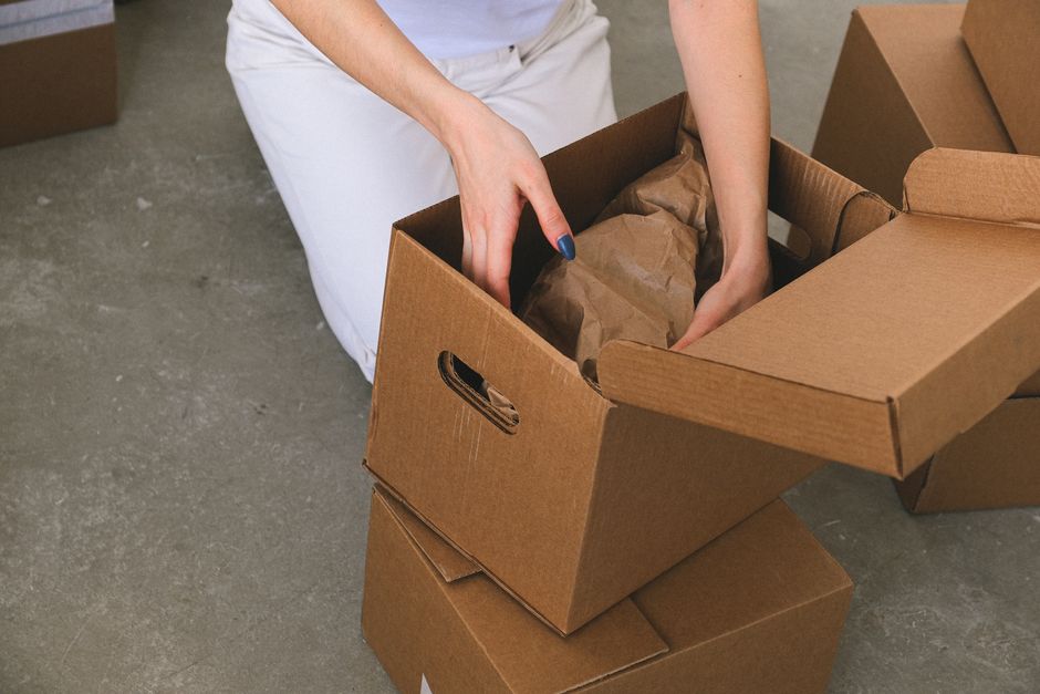 Local movers packing boxes